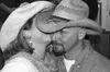 A bachelor gets a kiss during the Talkeetna Bachelor Ball and
Auction during the Winterfest celebration last December.
Frontiersman file photo.