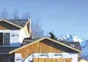 Workers install a roof on a new home in Pioneer Meadows south of
Palmer last week. New construction growth has returned to the
Valley as low interest rates have coincided with a tightening
ho