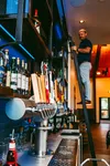 Joshua Broda, chef and operating owner at Chop House, checks inventory at the restaurant bar. The lakeside establishment is featuring a prime rib buffet dinner for its New Year’s Eve celebrat