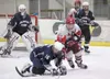 Wasilla juior Trent Wohlers scrambles around Soldotna’s Josh
Harvey during Thursday’s game at the Curtis C. Menard II Memorial
Ice Arena. Wasilla survived a slew of Stars power plays early on