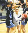 Palmer's Lilian Muilenburg drives through traffic inside. Bruce Eggleston/matsusports.net