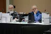 Alaska Board of Game member John Wood and Alaska Department of Fish and Game Commissioner Doug Vincent-Lang listen on Friday to public testimony at the first day of an eight-day Board of Game