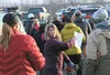 Volunteers take flyers of missing Palmer teen David Grunwald out into the community after being debriefed on the situation inside the First Baptist Church in Palmer on Saturday morning. Hundr