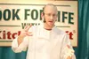 ROBERT DeBERRY/Frontiersman Ben Hennila entertains the crowd
during his cooking show Saturday at the Home Show.