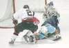 ROBERT DeBERRY/Frontiersman Alaska Avalanche goaltender Nate
Pellegrino blocks a shot from Brett Hartung of Wichita Falls during
Saturday’s game at the Curtis C. Menard II Memorial Ice Arena.