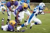 Palmer senior running back Mike Weber bursts through a set of
Lathrop tacklers in Palmer's 19-13 win over Lathrop last week.
Weber and fellow Moose running back Allen Franklin will try to lea