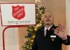 Major Kevin E. Bottjen, Mat-Su Valley Salvation Army Corps Officer holds the gold coin donated by a mystery donor. Courtesy photo.