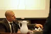Alaska State Trooper Sergeant Tony Wegrzyn examines evidence during the Dominic Johnson trial Wednesday at the Palmer Courthouse. Tim Rockey/Frontiersman