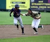Mat-Su shortstop Drew Swift tags Chugiak's Gregory Ozuna in a rundown during a 5-4 win over Chugiak Wednesday at Hermon Brothers Field in Palmer. Jeremiah Bartz/Frontiersman