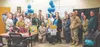 Military personnel and civilians gather for a photo during the 3rd Annual Sexual Assault Prevention and Response Open House on Joint Base Elmendorf-Richardson, Alaska, April 2, 2026. The open