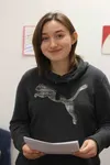 National Security Initiative for Youth Scholarship winner Haley Jenkins smiles holding her acceptance letter. Jenkins was chosen as a select participant of the yearlong all expense scholarshi