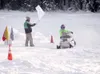 K.C. Cabana of Wasilla leans into a turn on his 1972 Yamaha GP
338 while outpacing the rest of the pack during a vintage
snowmachine race at Houston Lodge last February. Cabana won the
first 