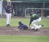An AIA Fire player slides under the tag of Mat-Su Miners pitcher
Matt Applegate during a game earlier this week that was canceled
due to rain. The Alaska Baseball League rivals meet again tod
