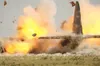 Courtesy photo/SSgt. Phillip Granath The wings of a C-130 that
went down north of Baghdad International Airport in 2008 are blown
off. Explosive ordnance crews developed a plan to recover the