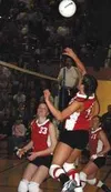 Wasilla's Lacey Adcock fires a shot over the net in the fourth
game of the state volleyball championships Saturday at West
Anchorage High School. Photo by TIM BRODT/Frontiersman.