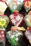VICKI NAEGELE/For the Frontiersman Big Lake artist Rita Gaffey
creates natural scenes on glassware. Victoria Naegele