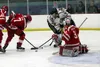 Former Colony standout Josh Boyer (48) tries to knock in a rebound against Wasilla during the 2014-15 season. Boyer is now playing for the Brookings Blizzard in the North American Hockey Leag