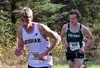 Colony senior Tracen Knopp follows closely behind Kodiak's Keith Oswoski during the 4A boys race of the Region III Championships Saturday in Soldotna. Osowski won the race, and Knopp finished