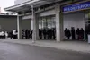 People line up outside of the downtown Anchorage Permanent Fund Dividend office on March 31, 2023, the last day to submit applications. Yereth Rosen/Alaska Beacon