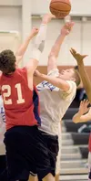 The Palmer Moose compete with Anchorage Christian School in a
scrimmage Friday at the AT&amp;T Sports Center during the final day
of the Alaska Basketball Academy Team Camp. More than 300 pla