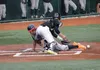 Former Colony Knights and Alaska Road Warriors standout Jacob Butcher, seen here sliding safely into home during the 2014 Alaska American Legion State Baseball Championships, has found succes