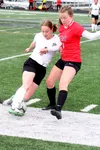 Colony’s Samantha Johnstone works past a defender during a 3-0 win over Kenai Friday. Tim Rockey/Frontiersman