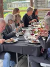 Diners at a recent farm-to-table dinner at Moonstone Farm near Palmer enjoy a four-course meal crafted from local ingredients. Photo courtesy of Moonstone Farm