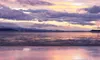 The sun sets over the Knik Arm, as seen here from the Goose Bay Wildlife Refuge Tuesday. Anchorage, which can be seen in the distance, is just a few short miles over the water from Mat-Su her