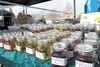 Jonsers handmade honey sits on display at Friday Flings in Palmer. The outdoor market attracts a variety of vendors from local farmers to food booths to handmade clothing. ROBERT DeBERRY/Fron