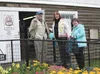 Ed and Rebecca Wineck stand in front of Wineck Barn at the Alaska State Fair with filmmaker Joan Juster during the fair in 2011. Wineck is featured in Juster’s film ‘Alaska Far Away,’ schedul
