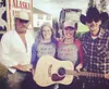 Musician and performer Marty Raney, Farmland Trust Board President Leslie Senden, Farmland Trust ED Amy Pettit, and musician and performer Ken Peltier pose for a photo. Courtesy photo