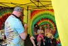 Randy Fischbach takes a picture of a local family for a photo button. Jacob Mann/Frontiersman