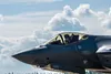 A U.S. Air Force pilot assigned to the 356th Fighter Squadron poses for a photo after landing a F-35A Lightning II during Red Flag-Alaska 25-3 at Eielson Air Force Base, Alaska, July 19, 2025