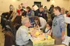 Michael Shower, right, learns a little more about home and property ownership from Kevin Crozier of ReMax and Kaitlyn Espada of Century 21. The two were volunteers at Friday’s ‘Get Real’ Real