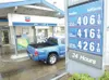 ROBERT DeBERRY/Frontiersman Bradley Holt fills his 21-gallon
tank at a cost of $71.60 Saturday morning at the Wasilla Chevron
station along the Parks Highway. Holt, who was going camping with