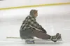 HEATHER A. RESZ/Frontiersman Debra Lighthart uses her adaptive
sled to glide across the ice at Brett Memorial Ice Arena Aug. 23.
She has multiple sclerosis and uses the sled as a tool to cont