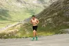 Sam Tilly, 28, of Anchorage, had a significant lead coming over the Pass in the marathon on Saturday. He broke his own record from 2011 by nine minutes, finishing in 2:51:24. CAITLIN SKVORC/F