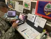 U.S. Air Force Senior Master Sgt. Ray Arceo, the 44th Aerial Port Squadron ramp services superintendent, conducts virtual training with unit members during the 624th Regional Support Group vi