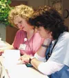 Debbie Larson, RN, left, goes over medical records with fellow
obstetrics nurse Karen Chambers, RN. Both nurses have logged many
years at Valley Hospital. Photo by KRISTEN SEINE/For the
Front