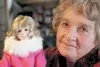 Judy Bowers holds her handmade and painted porcelain DeeDee Jonrowe doll. Bowers began making dolls in the 1990s. Her collection includes Iditarod mushers Joe Redington Sr., DeeDee Jonrowe an