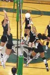 Wasilla's Sophia Taylor returns a shot across the net in
Friday's match against Colony. TIM BRODT/Frontiersman