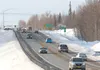 Traffic moves along the Palmer-Wasilla Highway Thursday afternoon. Plans are under way to widen sections of the road from the existing two lanes to three. The third lane will be a center turn