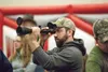 Mike Lamb checks out a rifle scope at the 2014 Wasilla High School Hockey Boosters Gun Show. This year's event will be held Saturday and Sunday from 10 a.m. to 5 p.m. ROBERT DeBERRY/Frontiers