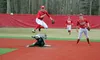 Wasilla infielder Ben Werner leaps into the air after making the throw as Colony's Trace Severson slides into second during a 5-3 win over the Knights Saturday May 5, 2018, at Wasilla High Sc