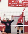 Wasilla junior Sylvia Tuisaula pushes the ball over the defense during a 3-0 win over Kodiak Oct. 17 at Wasilla High School. Jeremiah Bartz/Frontiersman