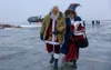 Santa and Mrs. Claus disembark from a C-17 Globemaster III towards an awaiting UH-60 Black Hawk helicopter in support of Operation Santa Claus at Bethel, Alaska, Nov. 15, 2023. Operation Sant