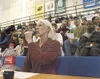 Michael Janecek works the announcers table during a Palmer High
School basketball game. Janecek, who was a former longtime
activities director at Palmer High School, was recently awarded a
ci