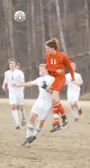 ROBERT DeBERRY/Frontiersman Colony junior forward Cody Fritz
collides with Wasilla's Tillerman Kroon as they they both try to
head the ball during Thursday game at Wasilla High School.