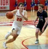 Wasilla's Gavin Morris drives to the basket during a win over Palmer. Bruce Eggleston/matsusports.net