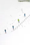 MATT TUNSETH/Frontiersman Members of the Alaska Pacific
University Ski Team coast downhill while training at Hatcher Pass
recently. The APU women’s team boasts the top three U.S. female
cross